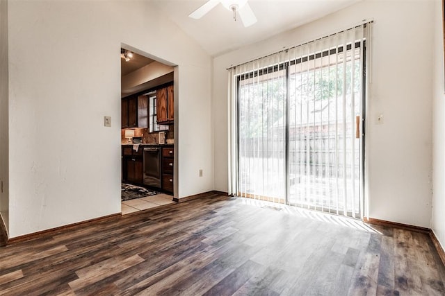 interior space with hardwood / wood-style floors, ceiling fan, and lofted ceiling