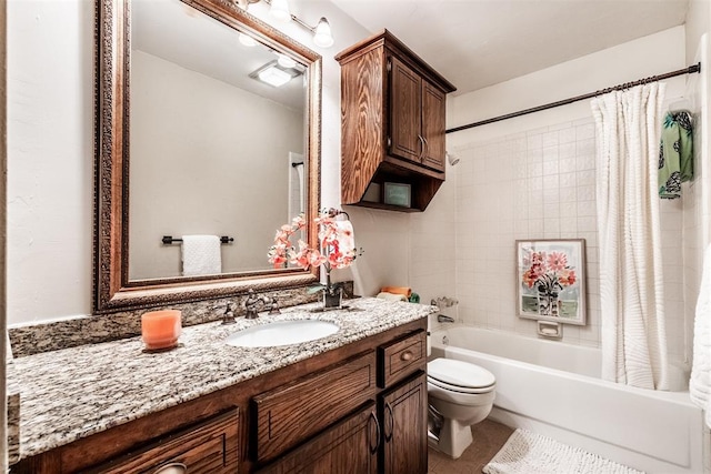 full bathroom with vanity, toilet, and shower / tub combo with curtain