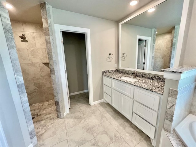 bathroom featuring shower with separate bathtub and vanity