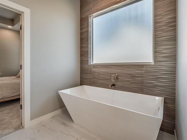 bathroom with a tub