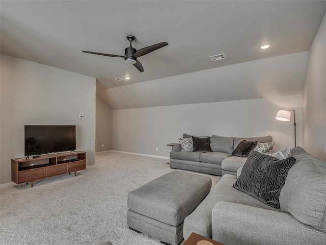 living room with ceiling fan, carpet, and vaulted ceiling