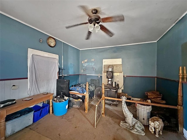 bedroom with concrete flooring, ceiling fan, and ornamental molding