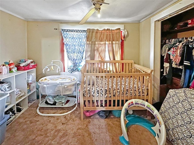 carpeted bedroom featuring ceiling fan