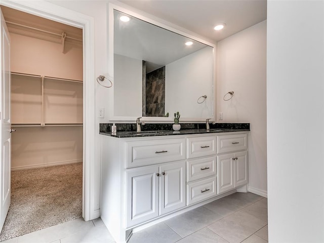 bathroom featuring tile patterned floors and vanity