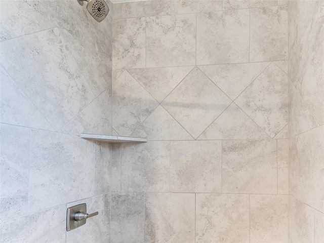 details with a tile shower