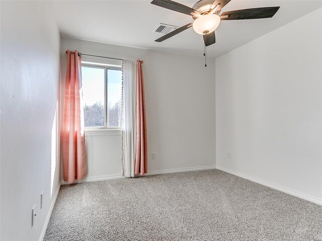 unfurnished room with carpet floors and ceiling fan