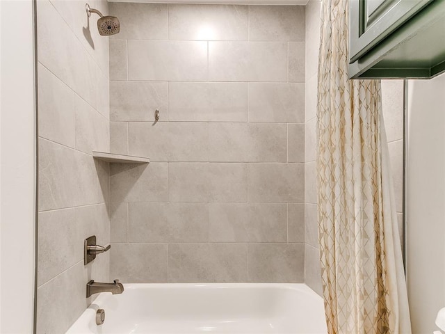 bathroom with shower / bathtub combination with curtain