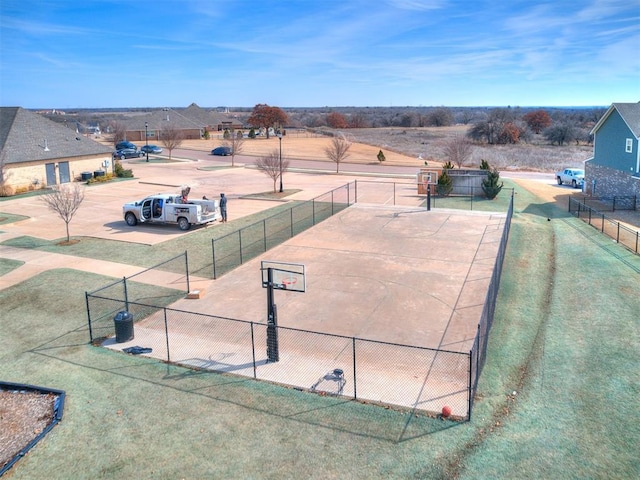 view of community featuring basketball court