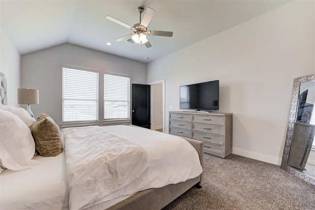 bedroom featuring ceiling fan, carpet floors, and vaulted ceiling