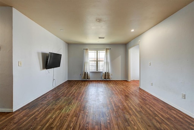 unfurnished living room with recessed lighting, baseboards, visible vents, and wood finished floors