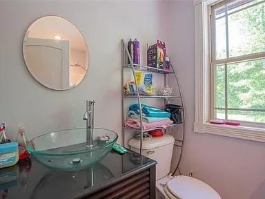 bathroom with vanity and toilet