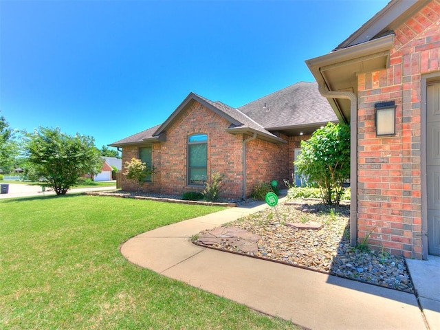 exterior space with a front yard