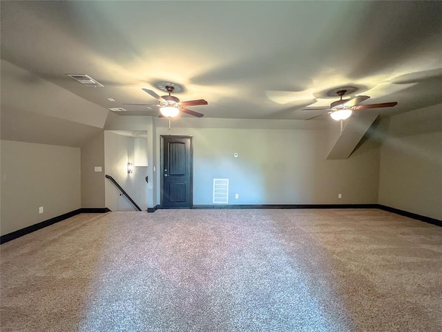 additional living space featuring ceiling fan