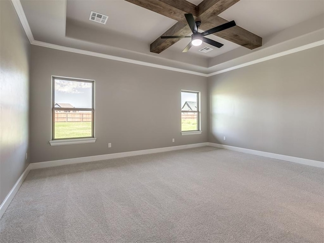 unfurnished room featuring baseboards, visible vents, and beam ceiling