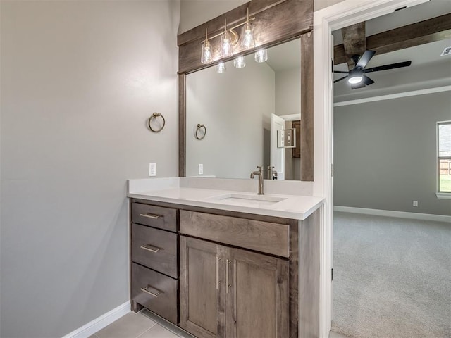 bathroom featuring visible vents, ceiling fan, vanity, and baseboards