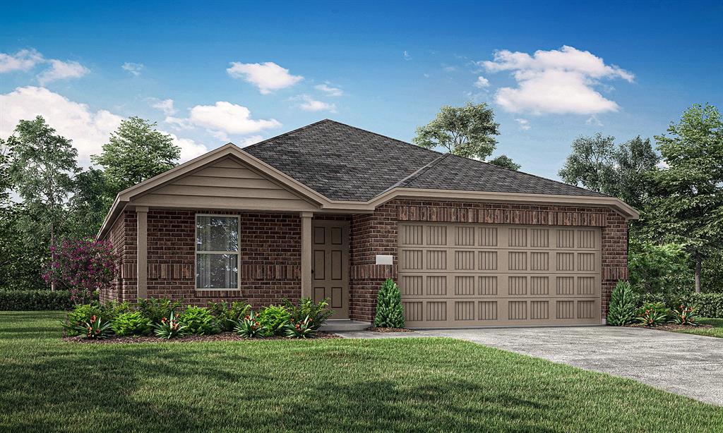 view of front of home featuring a front yard and a garage