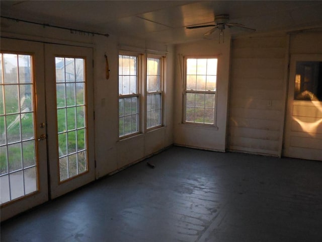 interior space featuring french doors and ceiling fan