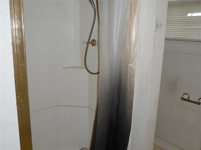 bathroom with curtained shower