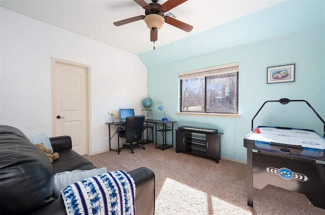 office space featuring ceiling fan, light colored carpet, and lofted ceiling