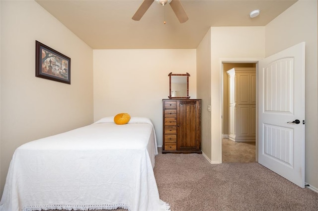 bedroom featuring ceiling fan and light colored carpet