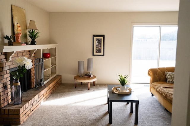 living room featuring carpet floors and a fireplace