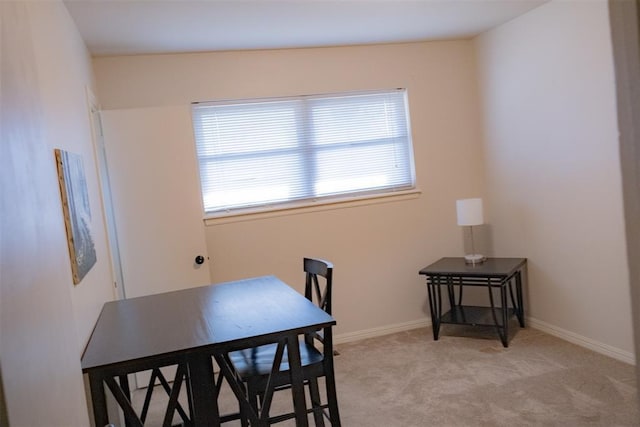 view of carpeted dining room