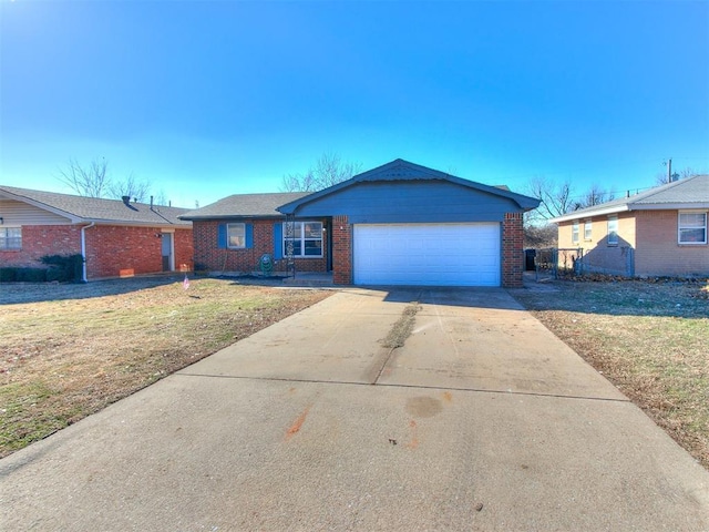 single story home with a front lawn and a garage