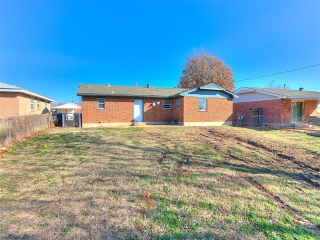 back of house with a yard and cooling unit