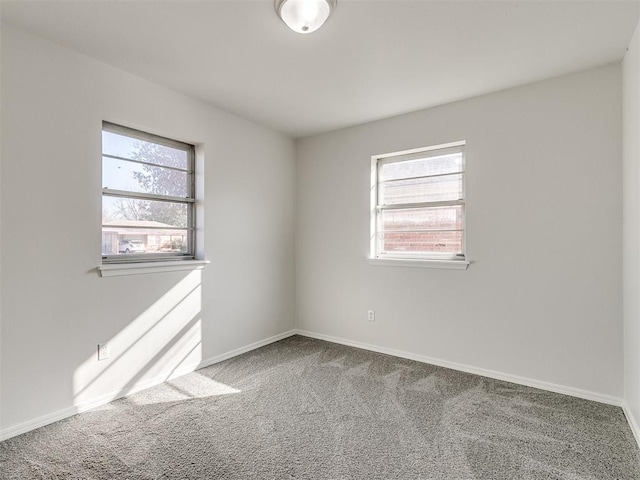 view of carpeted spare room