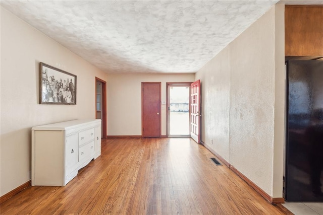 interior space with light hardwood / wood-style floors