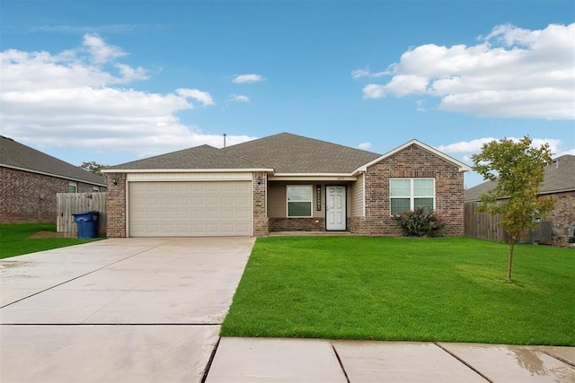 single story home with a front lawn and a garage