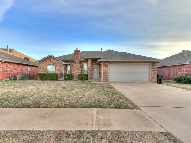 ranch-style house featuring a garage