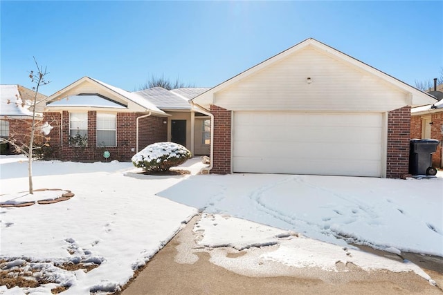 single story home featuring a garage