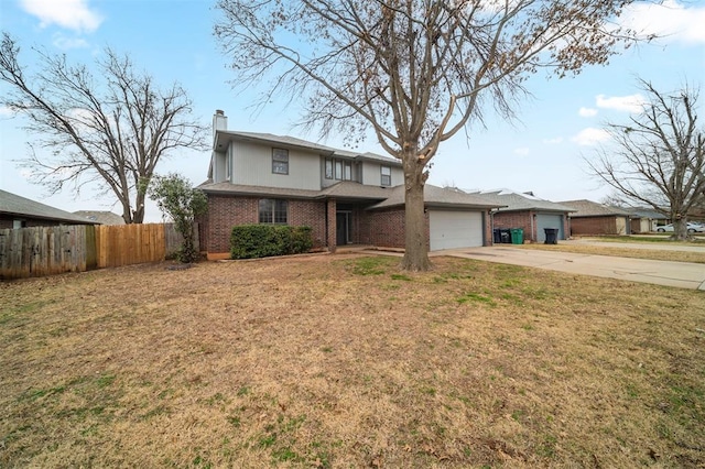 view of front facade featuring a front yard and a garage