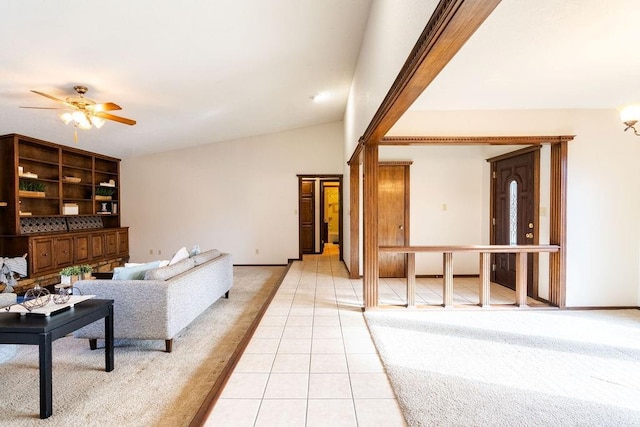 tiled living room featuring ceiling fan