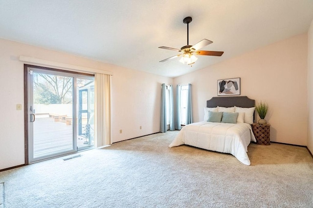 bedroom with ceiling fan, lofted ceiling, light carpet, and access to outside