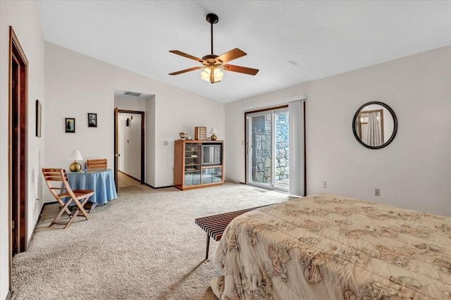carpeted bedroom with ceiling fan, access to exterior, and lofted ceiling