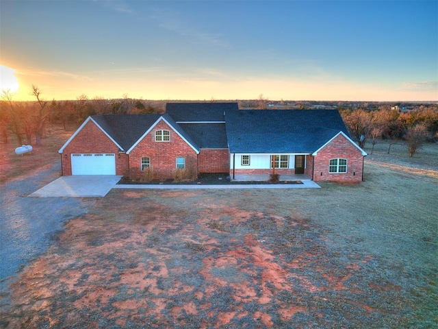 view of front of property with a garage