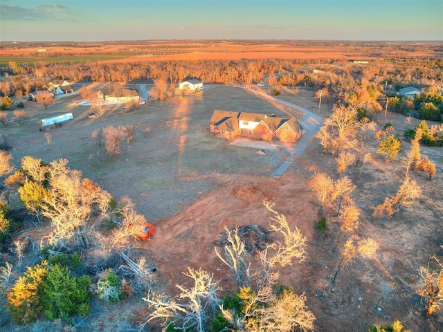 aerial view at dusk with a rural view