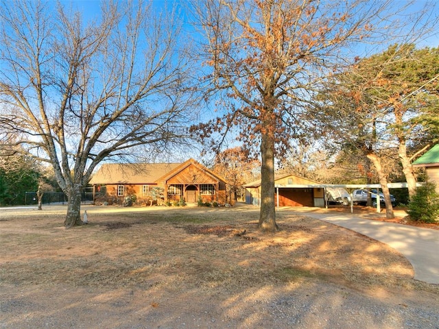 view of front facade featuring a carport and a garage