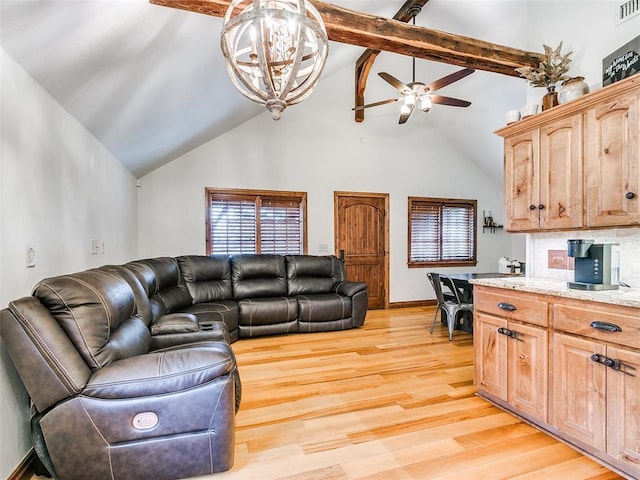 living room featuring beamed ceiling, ceiling fan with notable chandelier, high vaulted ceiling, and light hardwood / wood-style flooring