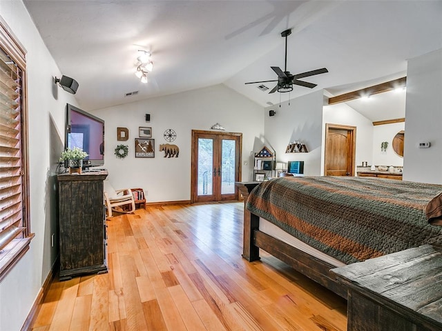 bedroom featuring french doors, light wood-type flooring, vaulted ceiling, and ceiling fan