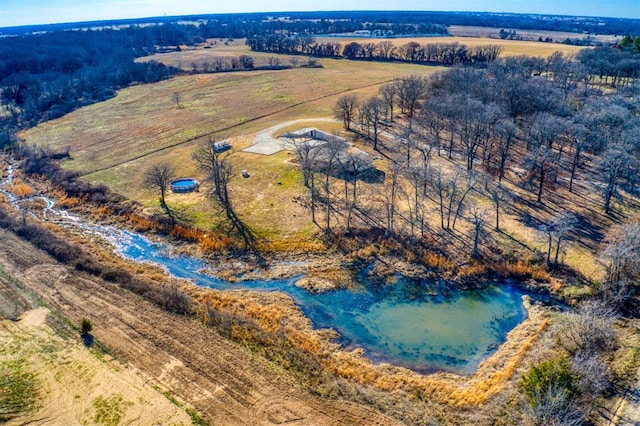 bird's eye view featuring a rural view and a water view