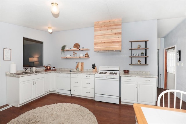 kitchen featuring light stone countertops, sink, dark hardwood / wood-style floors, white appliances, and white cabinets