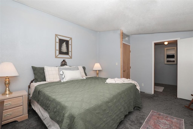 bedroom featuring dark colored carpet