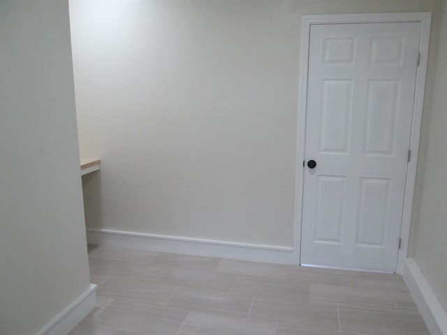 interior space with baseboards