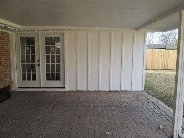 view of patio / terrace with fence and french doors