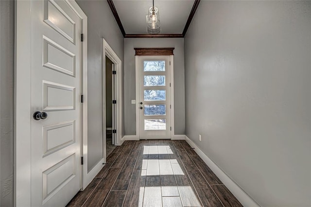 entryway featuring plenty of natural light and crown molding