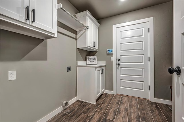 washroom featuring cabinets and hookup for an electric dryer