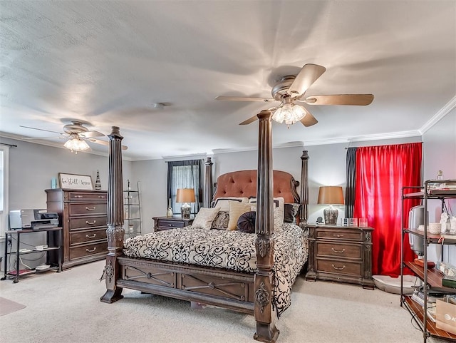 carpeted bedroom featuring ceiling fan and ornamental molding